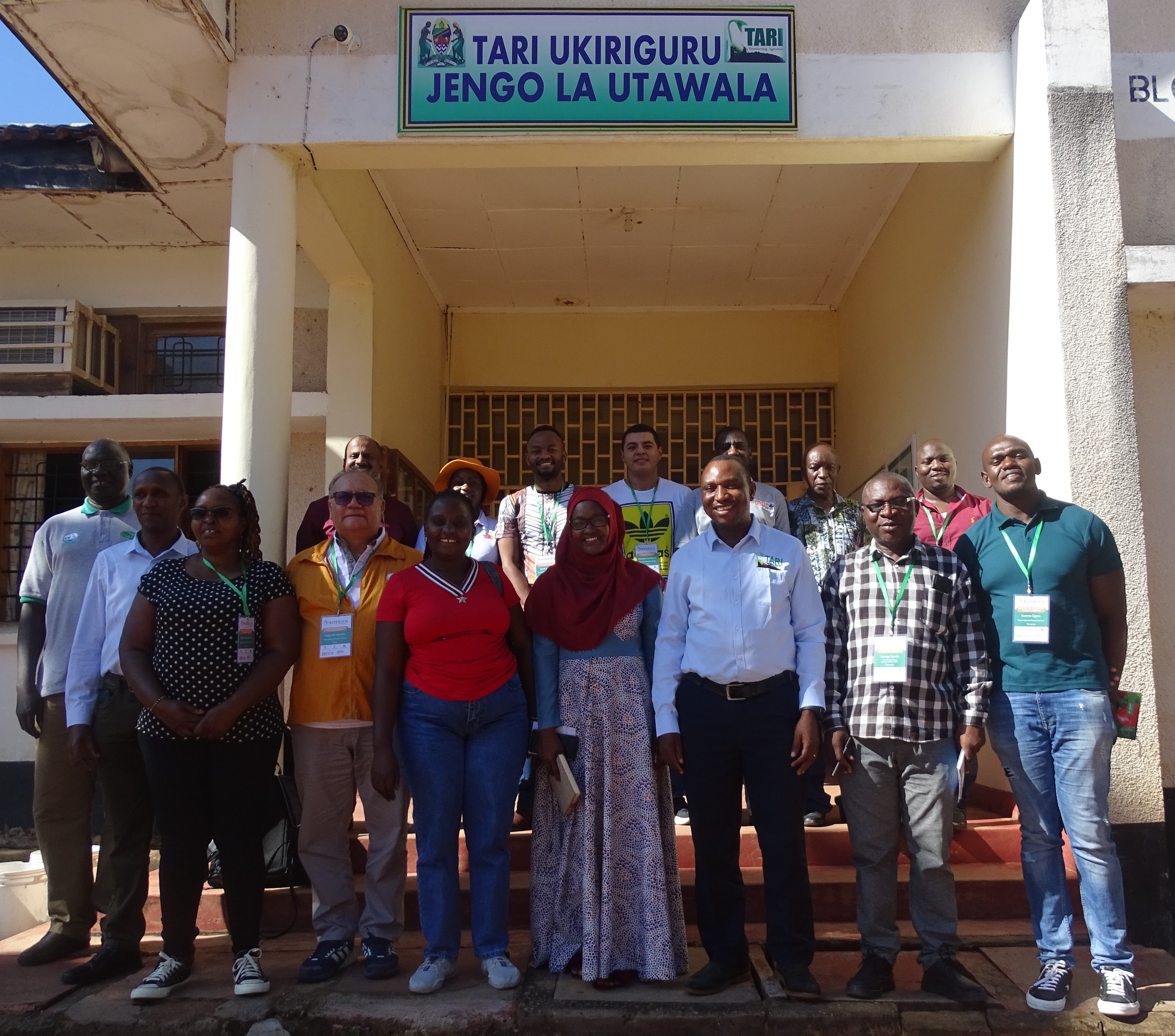 A TEAM OF SCIENTISTS FROM CIP- TANZANIA, CIP-UGANDA, CIP- NAIROBI  AND CIP- PERU IN A GROUP PHOTO WITH TARI UKIRIGURU CENTER DIRECTOR.